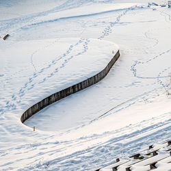 High angle view of snow covered land