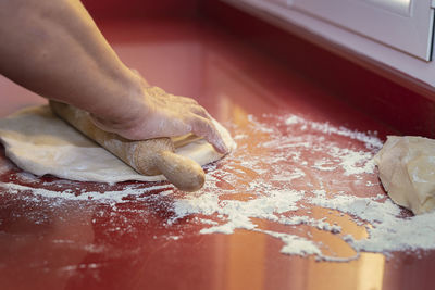 Close-up of person preparing food