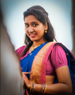 Portrait of a smiling young woman