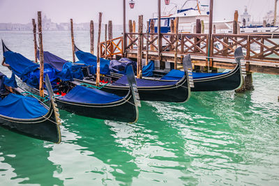 Gondolas in venice. boats moored in canal