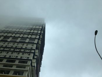 Low angle view of modern building against sky