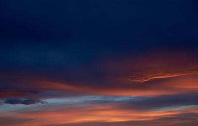 Low angle view of dramatic sky during sunset
