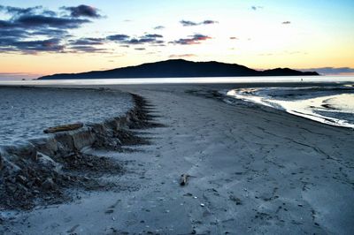 Scenic view of sea at sunset