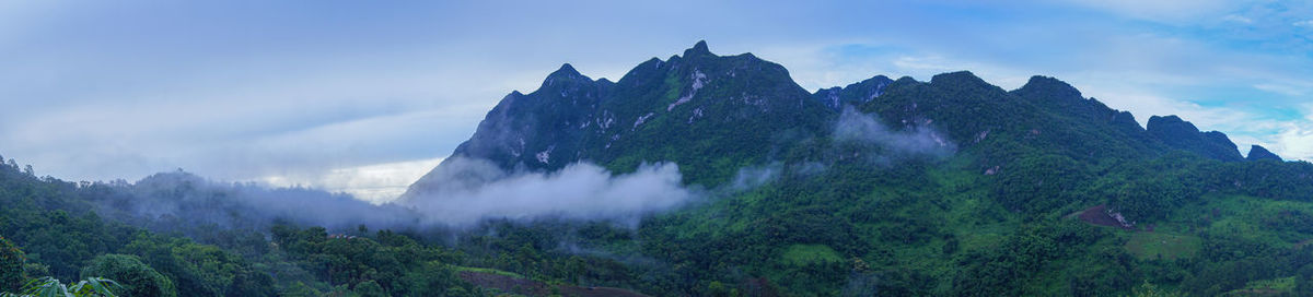 Panoramic view of mountains against sky