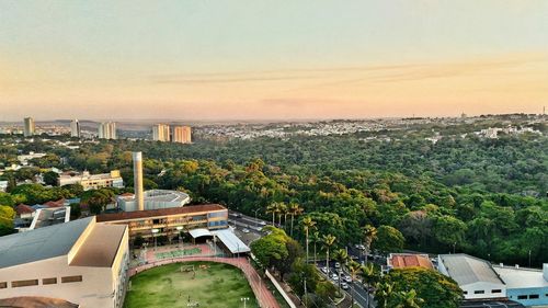 High angle view of city during sunset