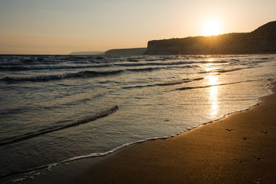 Scenic view of sea against sky during sunset