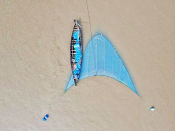 High angle view of fishing net into the river 