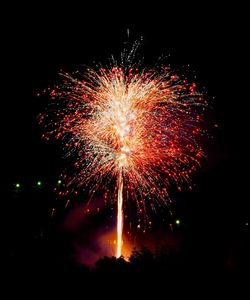 Firework display at night