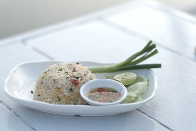 Close-up of food in plate on table