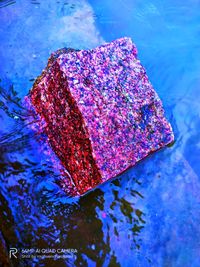 High angle view of water on rock in sea