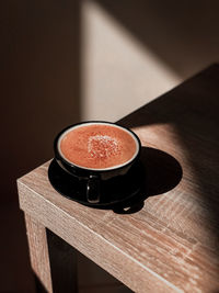 High angle view of coffee cup on table