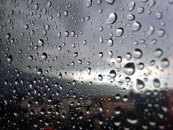 Close-up of water drops on glass