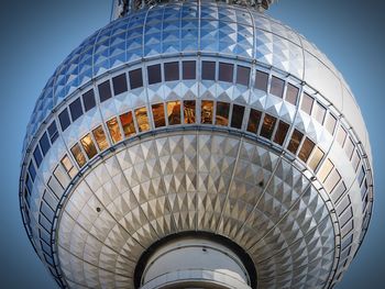 Low angle view of modern building against clear blue sky - berlin - alex