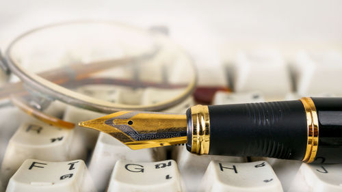 Close up of fountain pen on keyboard