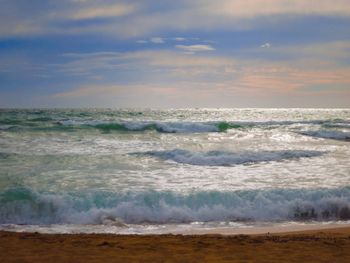 Scenic view of sea against sky during sunset