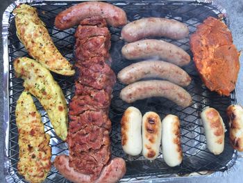 Close-up of meat on barbecue grill