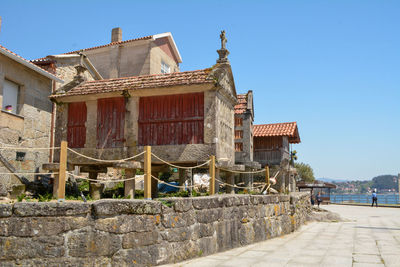 Old building against clear blue sky