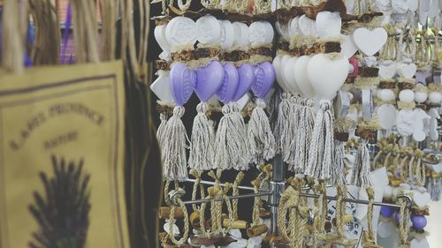 Clothes hanging in store for sale at market stall