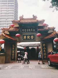 Group of people in front of building