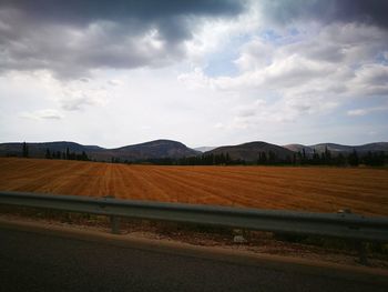 Scenic view of field against sky