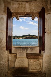 Sea seen through window