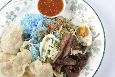 High angle view of breakfast served on table