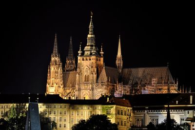 Illuminated church in city at night