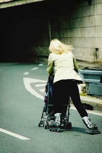 Full length of woman on road