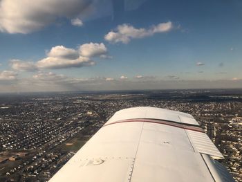 Aerial view of city against sky