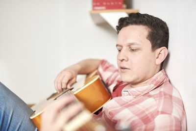 Portrait of man drinking coffee