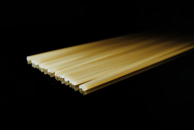 Close-up of pasta against black background