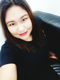 Portrait of smiling young woman
