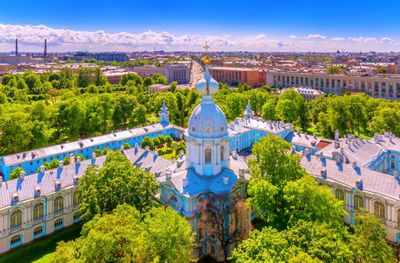 Wide angle aerial vibrant panorama of famous saint petersburg orthodox monastery in summer