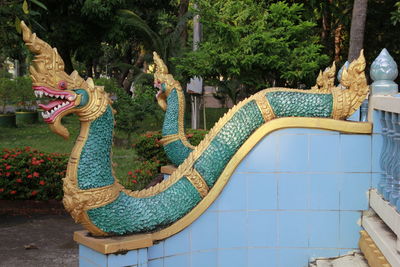 Side view of a female statue in swimming pool