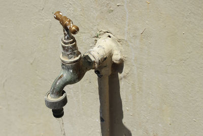 Close-up of water faucet