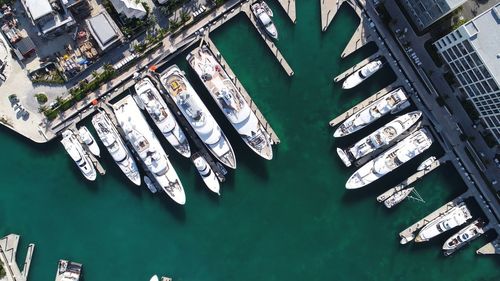 High angle view of boats moored at harbor