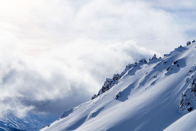 Scenic view of snow covered mountains