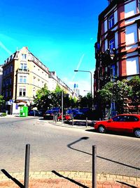 Road in city against clear sky