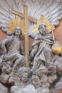 Low angle view of statue against ceiling