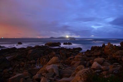 Scenic view of sea against sky at sunset