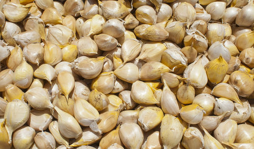 Full frame shot of garlics in market for sale