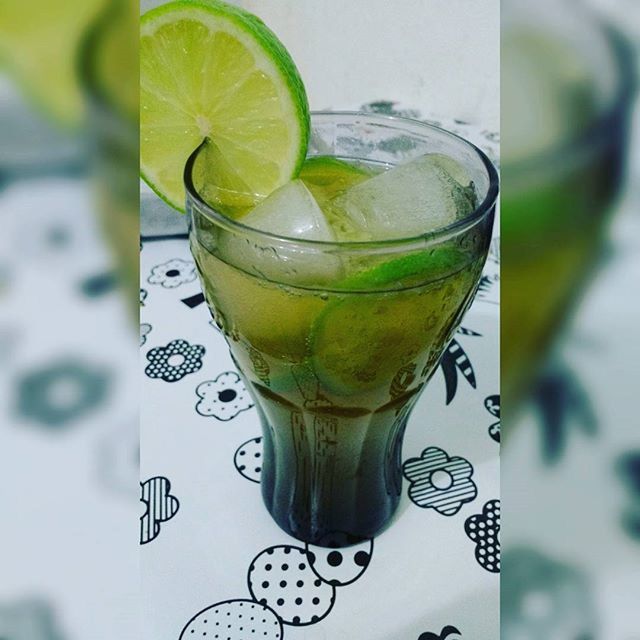 food and drink, drink, refreshment, freshness, drinking glass, close-up, focus on foreground, table, glass - material, indoors, still life, drinking straw, transparent, healthy eating, alcohol, cocktail, lime, lemon, glass, green color