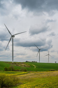 Windmills in landscape outside mollerup, låsby