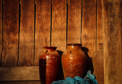 Close-up of bottles on wooden table