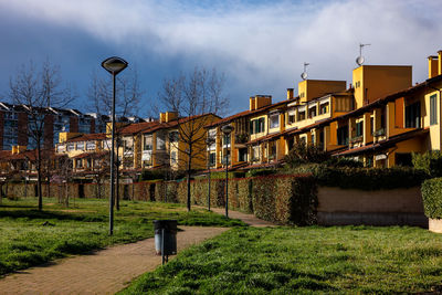 Buildings in city against sky