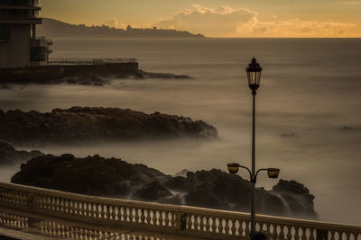 Scenic view of sea against sky at sunset