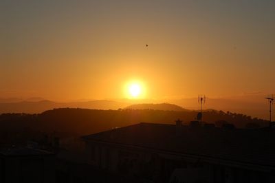 Scenic view of mountains at sunset