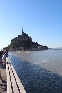 Scenic view of sea against clear blue sky