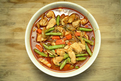 High angle view of chopped vegetables in bowl on table