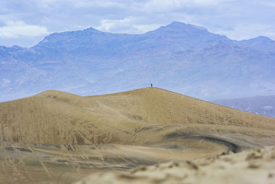 Scenic view of desert against sky